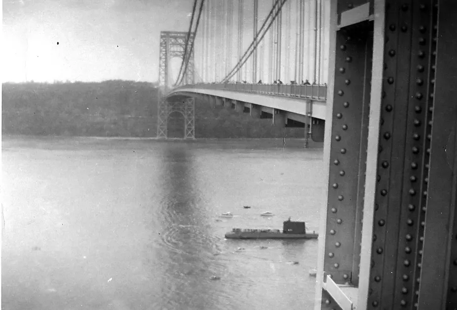 USS Nautilus passes under the George Washington Bridge in New York harbour, May 1956.