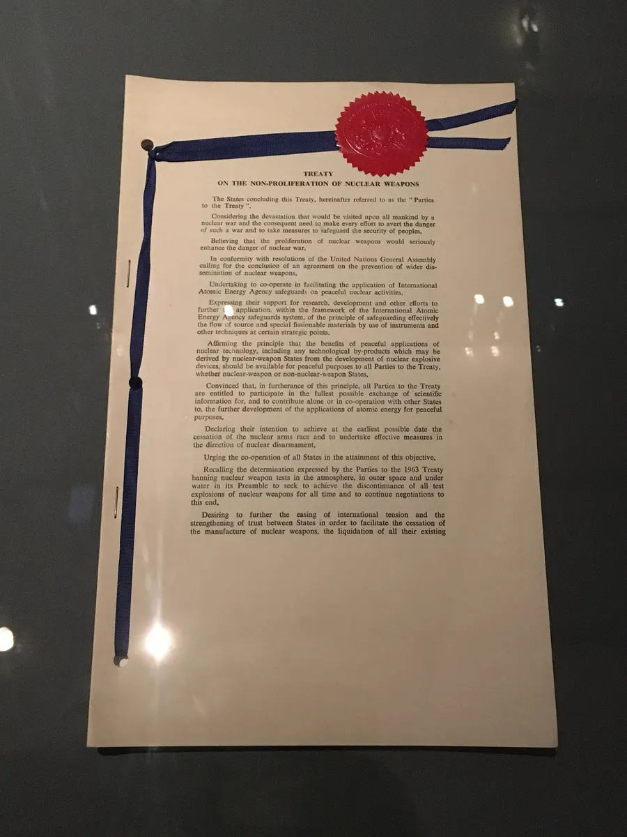 A signed copy of the Treaty on the Non-Proliferation of Nuclear Weapons on display.