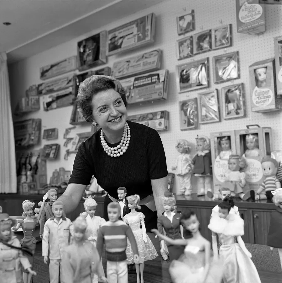 Ruth Handler of Mattel with a collection of Barbie dolls, 1961.