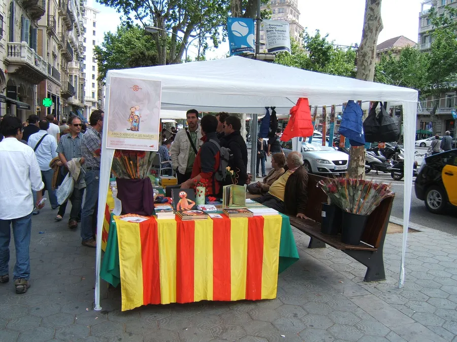 A bookstall decked in Catalan colours on Passeig de Gràcia, Barcelona, for the Sant Jordi book and rose day.