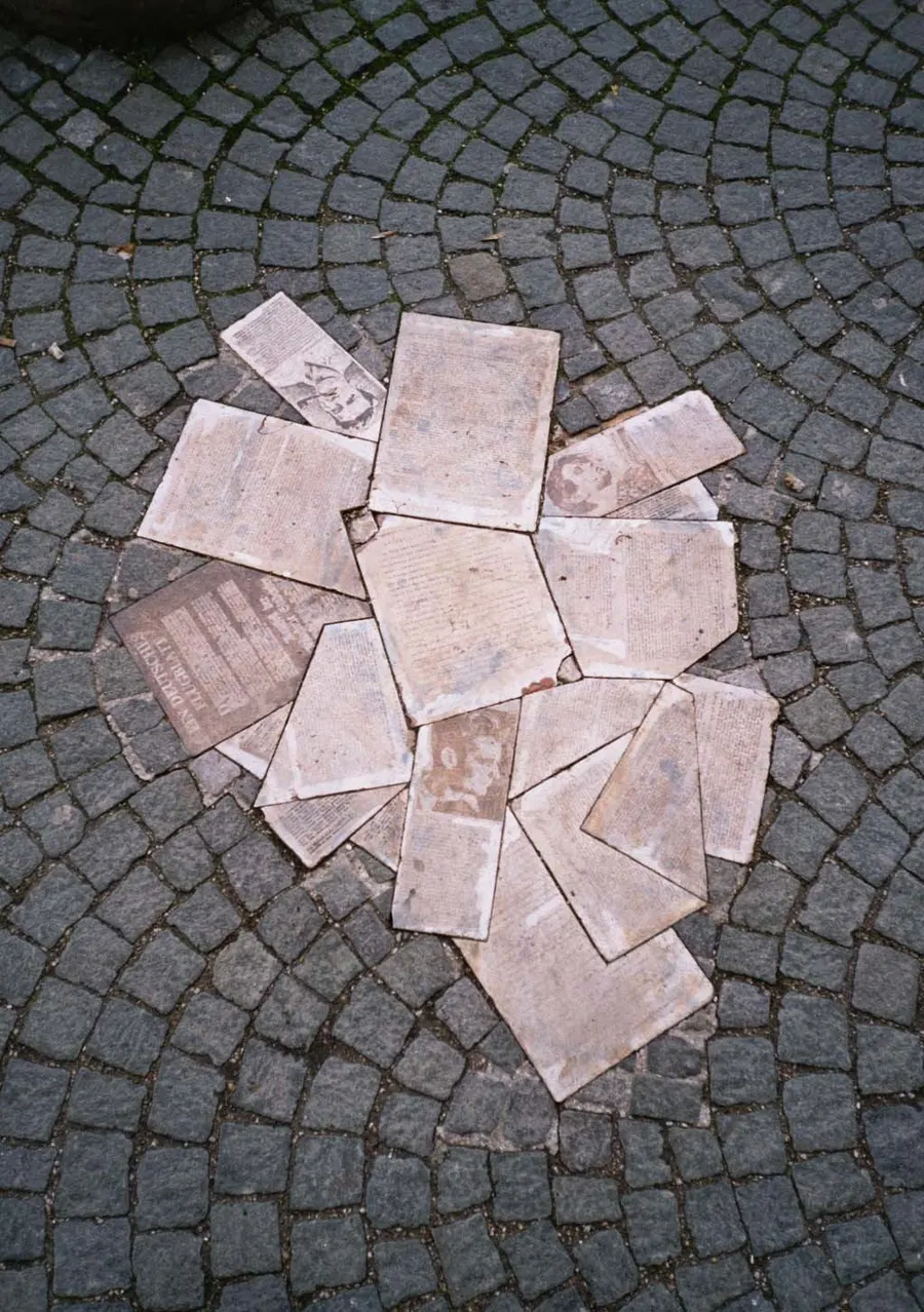 The White Rose memorial outside the University of Munich: bronze copies of the group's leaflets set into the pavement.