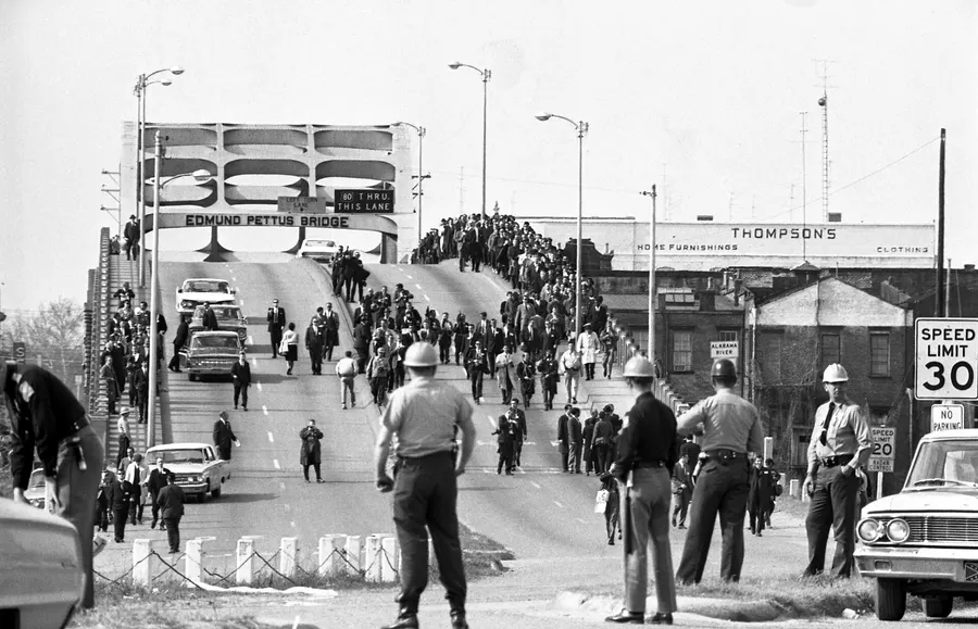 Alabama officers wait for the marchers at the end of the Edmund Pettus Bridge, 7 March 1965.