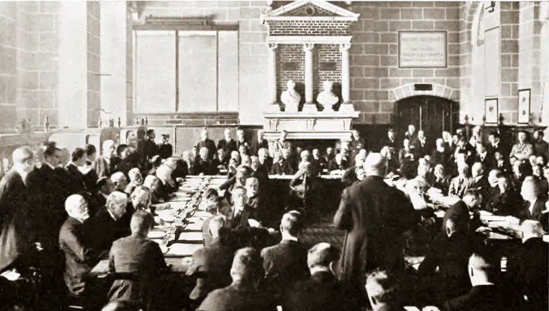 Karl Renner, head of the Austrian delegation, addresses the Allied delegates as the peace terms are handed over at Saint-Germain in 1919