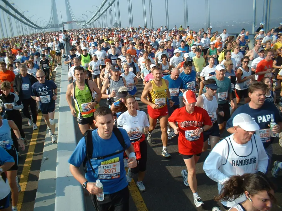Runners crossing the Verrazzano-Narrows Bridge at the start of a modern New York City Marathon