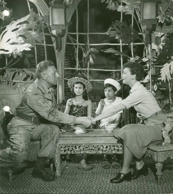 Ezio Pinza, Mary Martin and the child actors in the final scene of the original South Pacific, 1949.