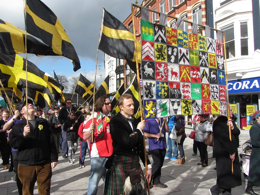 The St David's Day parade in Cardiff, 2014, with the black-and-gold flag of St David.