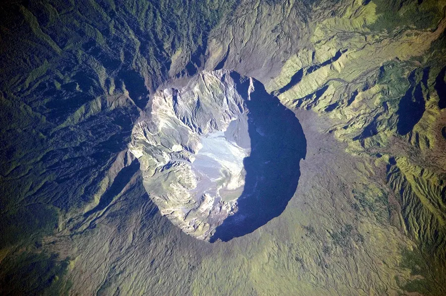 The 6-kilometre-wide crater of Mount Tambora on Sumbawa, Indonesia, photographed from the International Space Station in 2009.