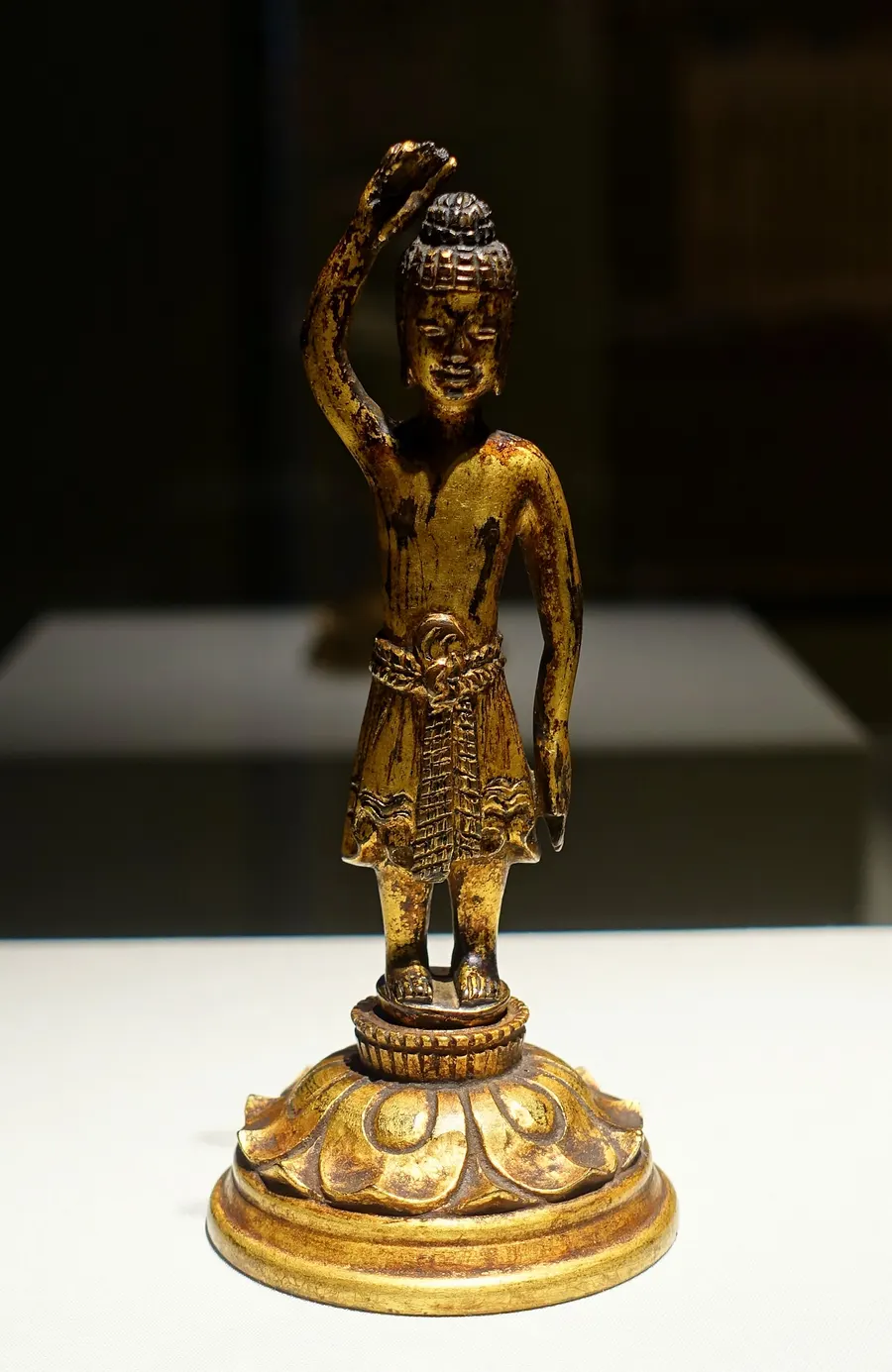 A gilt-bronze figure of the Buddha at birth, Japan, 7th century, in the Freer Gallery of Art, Washington.