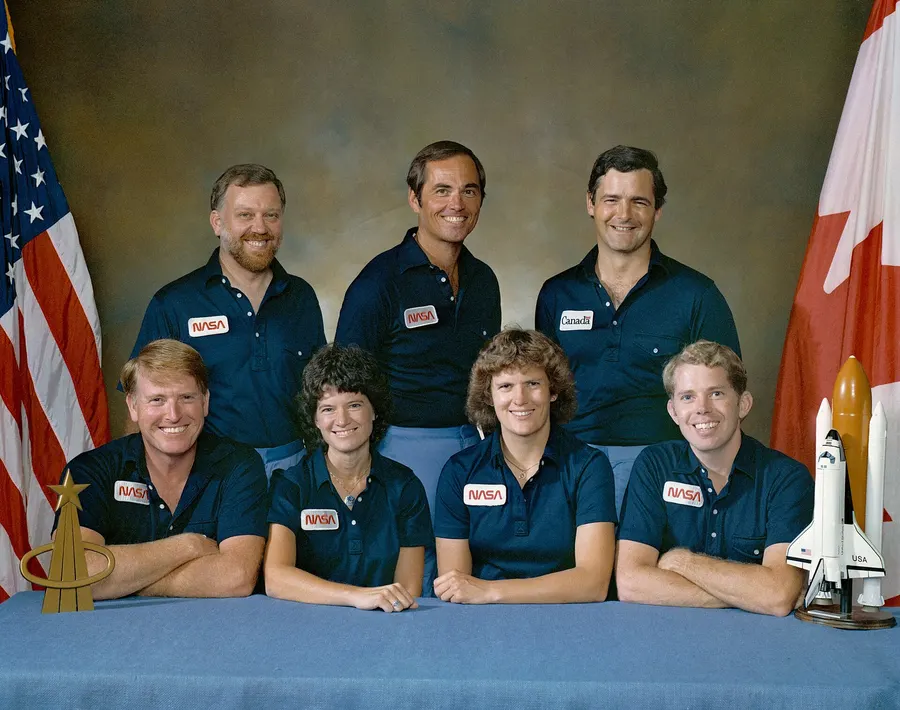 The STS-41G crew. Marc Garneau stands second from the right.