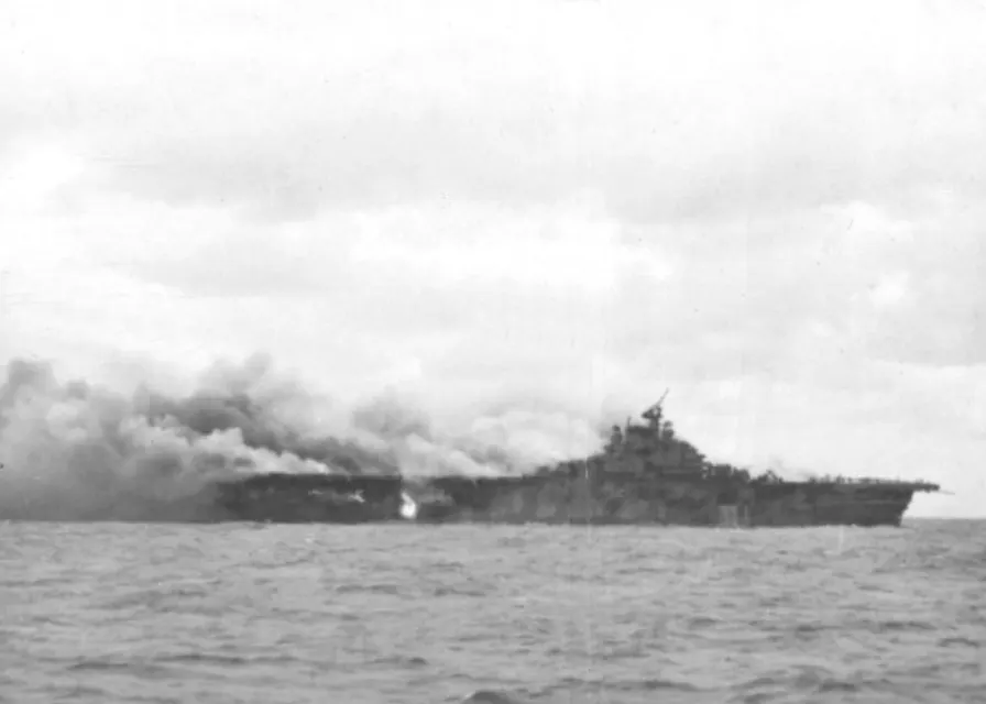 USS Franklin burning and listing on 19 March 1945.