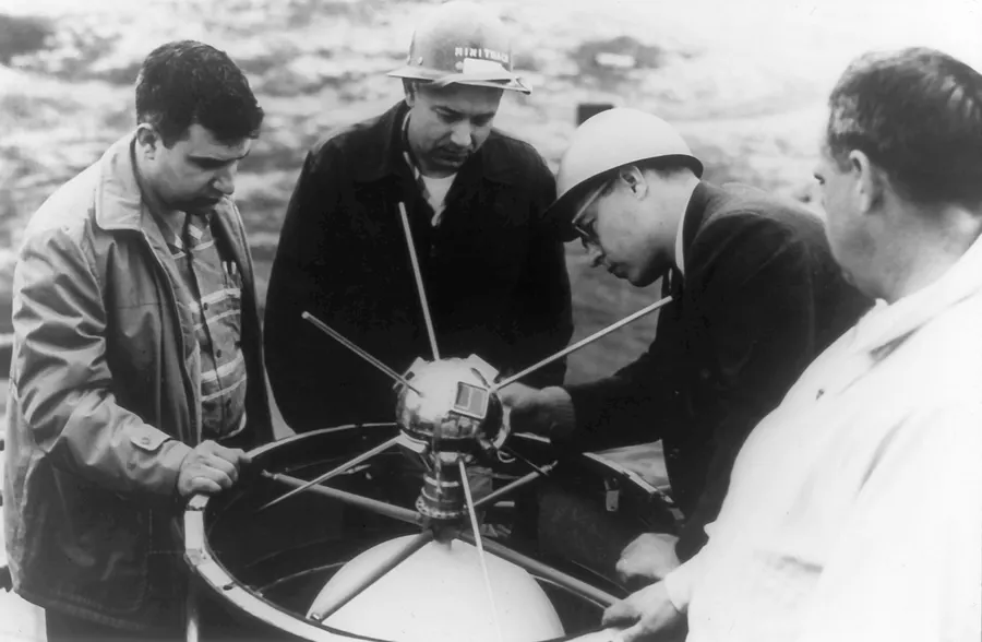 Scientists of the US Naval Research Laboratory mount the Vanguard 1 satellite on its rocket, 1958.