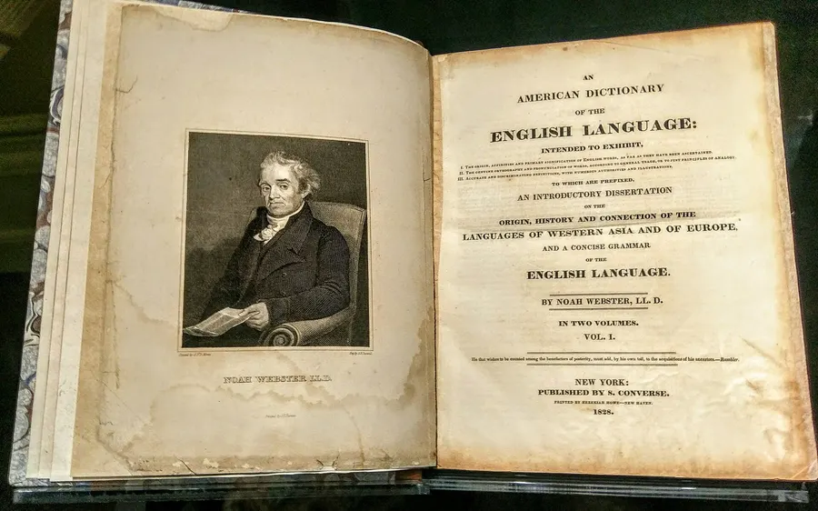 The title page and frontispiece portrait of Noah Webster's American Dictionary, 1828 (California State Library).