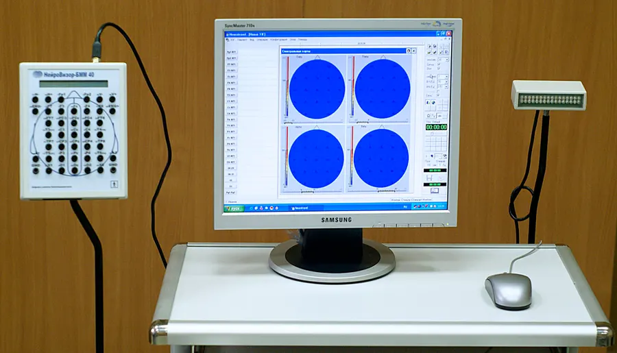 An electroencephalograph running Windows XP, its taskbar visible at the foot of the screen; no freely licensed picture of the 2001 launch exists.