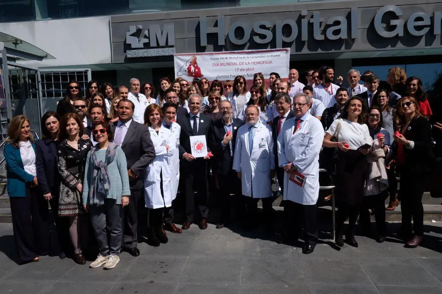 Staff and visitors mark World Hemophilia Day at La Paz hospital in Madrid.