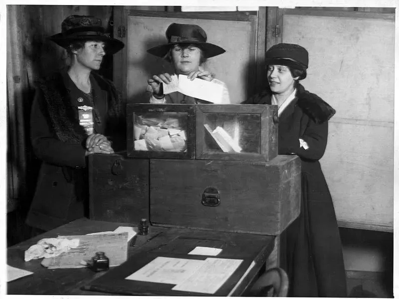 Women casting votes in Wyoming; the photograph is from a later generation than the 1869 act.