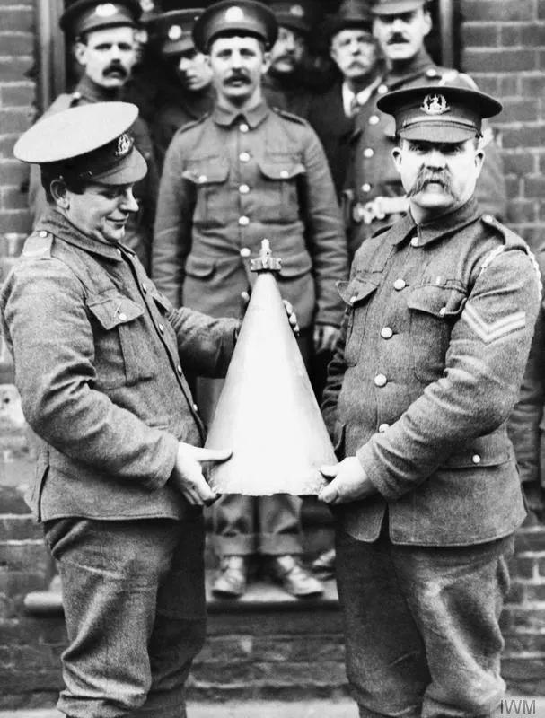 Men of the Norfolk Regiment with part of a German bomb dropped on Great Yarmouth by Zeppelin L3 on 19 January 1915.